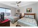 Bright bedroom with two beds and a view at 3799 S Atlantic Ave # 1006, Daytona Beach, FL 32118