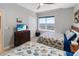 Comfortable bedroom featuring two beds and a view at 3799 S Atlantic Ave # 1006, Daytona Beach, FL 32118