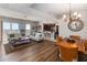 Spacious living room open to kitchen with views and elegant furnishings at 3799 S Atlantic Ave # 1006, Daytona Beach, FL 32118