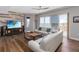 Inviting living room with stylish decor and sliding glass doors to balcony and ocean view at 3799 S Atlantic Ave # 1006, Daytona Beach, FL 32118