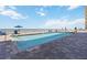 Beautiful oceanfront pool with lounge chairs overlooking the beach, perfect for relaxation and enjoying the ocean view at 3799 S Atlantic Ave # 1006, Daytona Beach, FL 32118