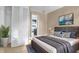 Comfortable bedroom with a plush bed, neutral walls, and a spacious closet at 4108 Drexel Ave, Orlando, FL 32808