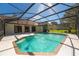 Screened in pool with patio and view of the yard at 4464 Willow Wind Ct, Orlando, FL 32835