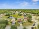 Beautiful neighborhood with a scenic pond and mature trees at 5118 Luna Negra Dr, Orlando, FL 32811