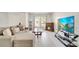 The living room features a fireplace and light colored floors at 5118 Luna Negra Dr, Orlando, FL 32811