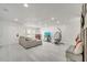Spacious living room features neutral tones, a fireplace, and modern decor at 5118 Luna Negra Dr, Orlando, FL 32811