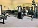 Well-equipped gym with a variety of weight machines and exercise equipment for residents at 5468 E Michigan E St # 4, Orlando, FL 32812