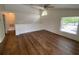 Bright living area with vaulted ceilings and hardwood floors at 5468 E Michigan E St # 4, Orlando, FL 32812