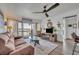 A cozy living room with lake view and comfortable seating perfect for relaxing or entertaining guests at 574 Orange Dr # 78, Altamonte Springs, FL 32701