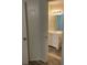 Well-lit bathroom with wood-style flooring and modern vanity at 627 Dory Ln # 202, Altamonte Springs, FL 32714