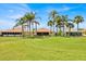 The property features a well-manicured green space and the house has a screened lanai at 633 Watercrest Dr, Haines City, FL 33844