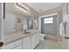 Bathroom with vanity and tiled tub/shower at 633 Watercrest Dr, Haines City, FL 33844