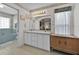 Bright bathroom with dual sinks and a separate toilet room, providing convenience and privacy at 633 Watercrest Dr, Haines City, FL 33844