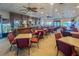 Spacious clubhouse bar area with seating, offering a place to socialize and relax with friends at 633 Watercrest Dr, Haines City, FL 33844