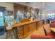 The clubhouse bar with wood accents and a selection of snacks and drinks at 633 Watercrest Dr, Haines City, FL 33844