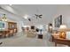 Spacious living room featuring tile flooring and ample seating, perfect for gatherings at 633 Watercrest Dr, Haines City, FL 33844