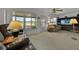 Spacious living room with large windows and outdoor view at 633 Watercrest Dr, Haines City, FL 33844