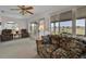 Comfortable living room with large windows and outdoor views at 633 Watercrest Dr, Haines City, FL 33844