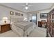 Comfortable bedroom with a ceiling fan, providing a relaxing retreat for rest and relaxation at 633 Watercrest Dr, Haines City, FL 33844