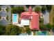 Aerial view of community center, tennis courts, and pool at 6419 Borg St, Leesburg, FL 34748