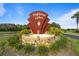 Highland Lakes community sign with manicured landscaping and beautiful fountain at 6419 Borg St, Leesburg, FL 34748