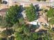 Aerial view of the neighborhood showing the home's location, mature trees, and surrounding area at 6508 Coral Cove Dr, Orlando, FL 32818