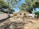 Backyard view, showing fence and the rear of the home at 6508 Coral Cove Dr, Orlando, FL 32818