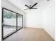 Living room with sliding glass doors to backyard at 6508 Coral Cove Dr, Orlando, FL 32818