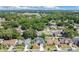 Aerial neighborhood shot showcasing tree lined residential streets and surrounding community features at 8603 Black Creek Blvd, Orlando, FL 32829