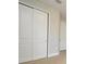 A closet is featured inside a bedroom at 8742 Peachtree Park Ct, Windermere, FL 34786