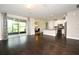 Bright living room flows seamlessly into the kitchen with sliding door access to the lanai at 8742 Peachtree Park Ct, Windermere, FL 34786
