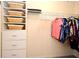 Organized closet with shelves, baskets, drawers, and hanging rods for optimal storage at 9573 Southern Garden Cir, Altamonte Springs, FL 32714