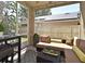 Cozy screened-in patio with comfortable seating, ideal for relaxing and enjoying the backyard view at 9573 Southern Garden Cir, Altamonte Springs, FL 32714