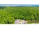An aerial view of a cul-de-sac home with large greenbelt behind the property at 1005 Talon Pl, Winter Springs, FL 32708