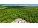 Wonderful aerial view of homes backing up to mature trees at 1005 Talon Pl, Winter Springs, FL 32708