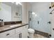 Beautiful bathroom featuring modern design, shower with glass door, and elegant finishes at 1005 Talon Pl, Winter Springs, FL 32708