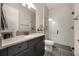 Modern bathroom with sleek vanity, shower, and contemporary finishes at 1005 Talon Pl, Winter Springs, FL 32708