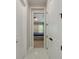 Hallway leading to the primary bedroom, with marble tile floors at 1005 Talon Pl, Winter Springs, FL 32708