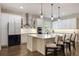 Bright kitchen featuring a large island, modern appliances, and white cabinetry at 1005 Talon Pl, Winter Springs, FL 32708