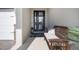 Cozy front porch with seating, decorative accents, and a welcoming entrance at 1005 Talon Pl, Winter Springs, FL 32708