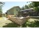Spacious backyard with brick paved area leading to screened in porch and pool at 1101 N Division St, Oviedo, FL 32765