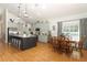 Spacious kitchen featuring a large island and a dining table at 1101 N Division St, Oviedo, FL 32765