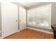 Bright office space with natural light, neutral paint, and two closets at 1101 N Division St, Oviedo, FL 32765