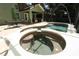 Hot tub and fountain in the pool area, with outdoor seating and covered patio at 1101 N Division St, Oviedo, FL 32765