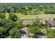 Charming home situated with a view of the golf course, surrounded by mature trees at 1139 Fairway Dr, Winter Park, FL 32792