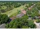 Charming home situated with a view of the golf course, complemented by mature trees at 1139 Fairway Dr, Winter Park, FL 32792