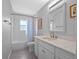 Updated bathroom showcasing vanity with white cabinets and tub-shower combo with modern finishes at 1139 Fairway Dr, Winter Park, FL 32792