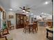 Dining room with a vintage china cabinet and an open layout to the kitchen at 1139 Fairway Dr, Winter Park, FL 32792