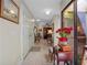 Inviting foyer with tiled floors with a view into a dining and living area at 1139 Fairway Dr, Winter Park, FL 32792