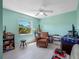 Sitting room featuring chair, table and lamp, window view, and ceiling fan at 1139 Fairway Dr, Winter Park, FL 32792